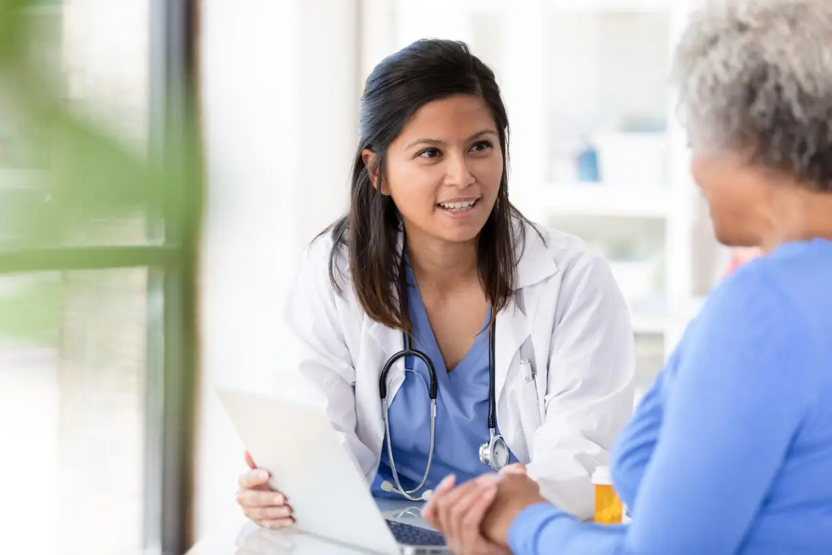 Female doctor giving informed medical consent to her patient.